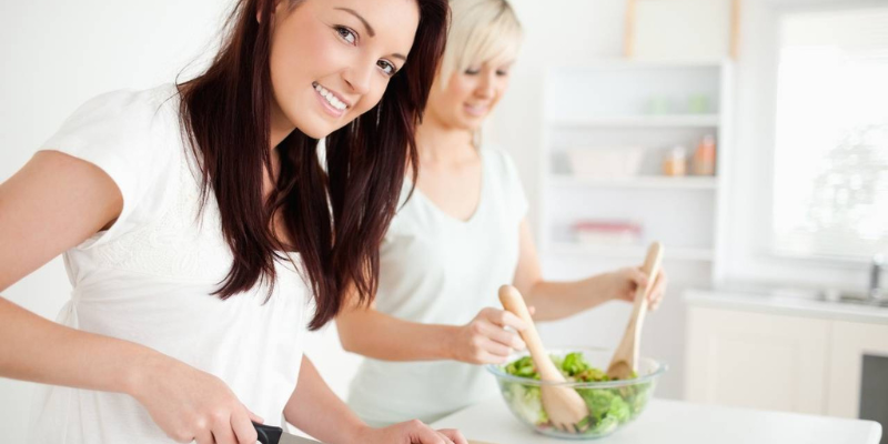 Woman preparing food in kitchen